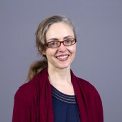 Dr. Emily Leckman-Westin smiles at the camera.