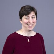 Dr. Haley smiles at the camera.