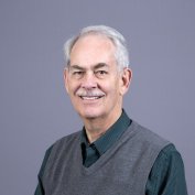 Dr. Smith smiles at the camera.